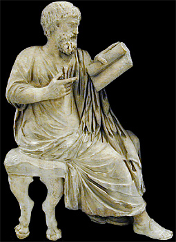 relief of man reading scroll