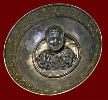 silver bowl with Hercules and snakes